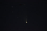 Cometa con passaggio di un aereo